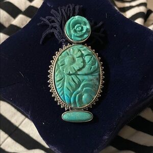 Turquoise Floral Pendant AKR 
Where as  a brooch or pendant
